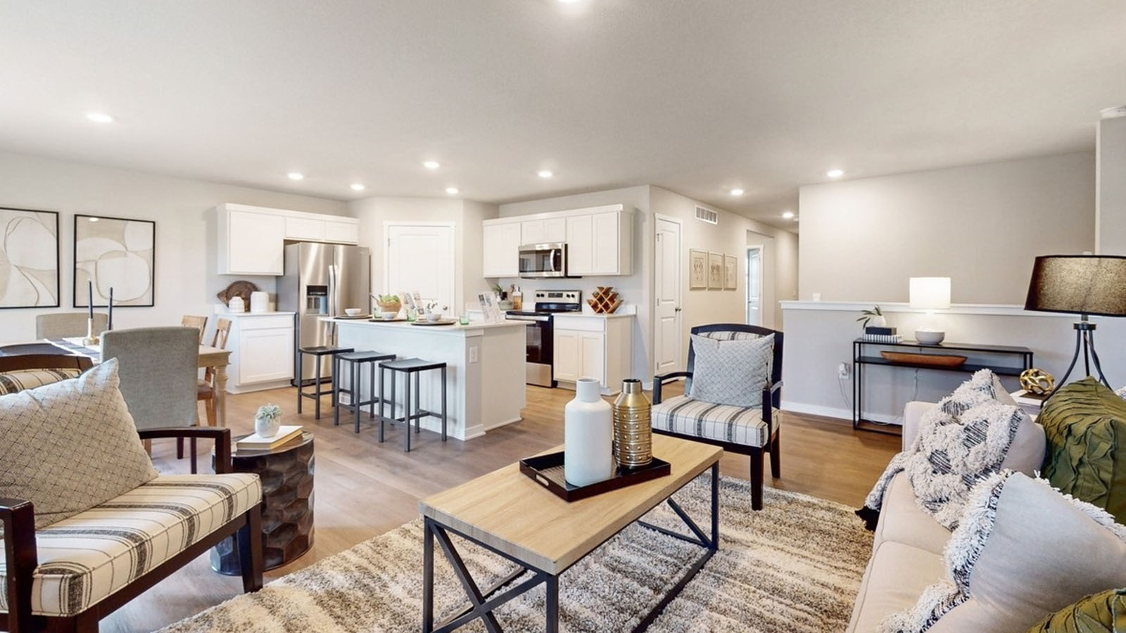 Open concept living room with electric fireplace