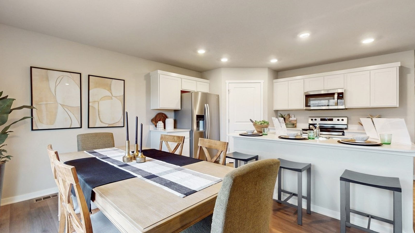 Open concept dining space with access to backyard