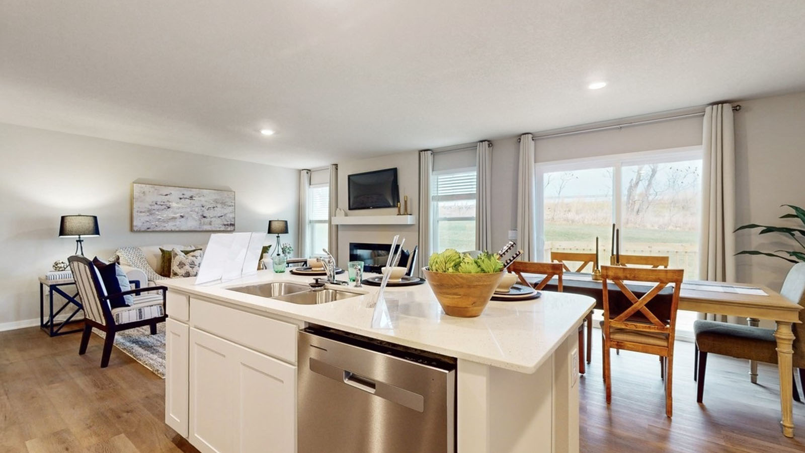 Kitchen with white cabinetry and quartz countertop