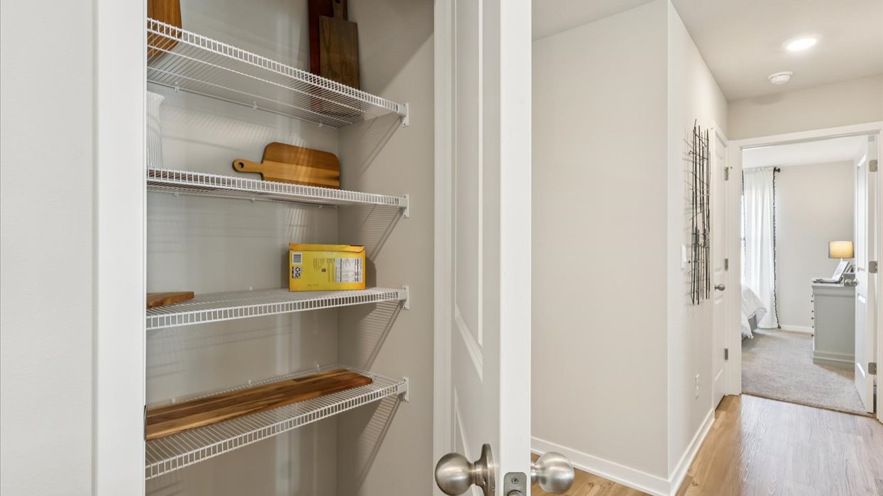 Kitchen with white cabinetry and quartz countertop