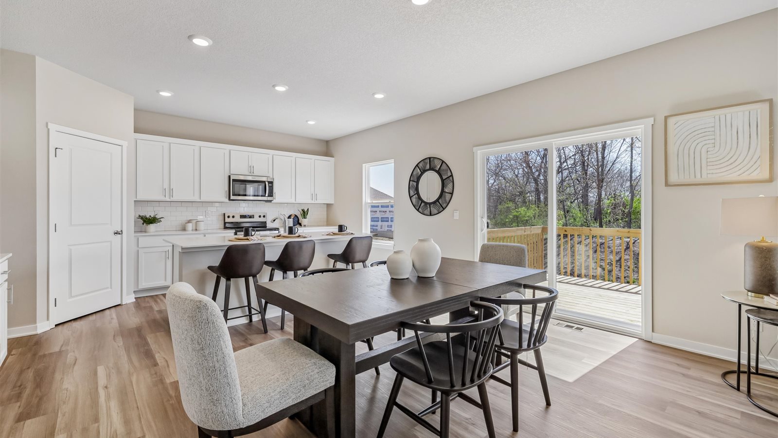 Open concept dining space with access to backyard