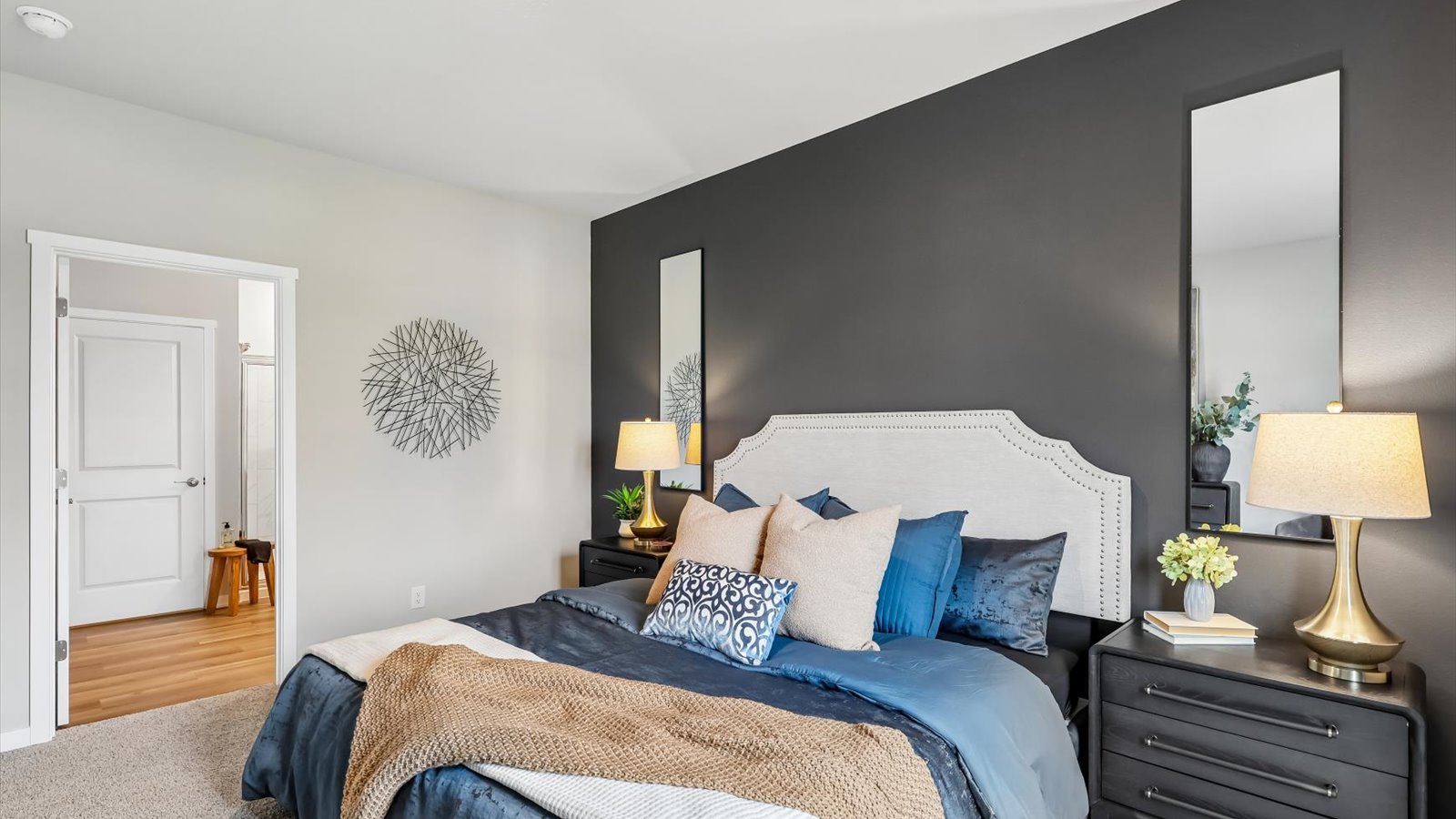 Primary bedroom with natural lighting and spacious layout