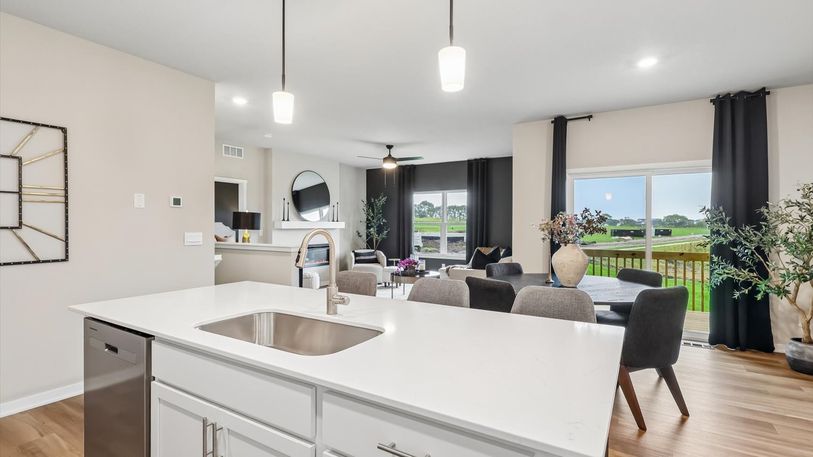 Kitchen with white cabinetry and quartz countertop