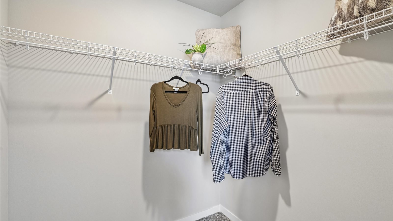 Spacious walk-in closet offering ample room for clothing, accessories, and everyday essentials.