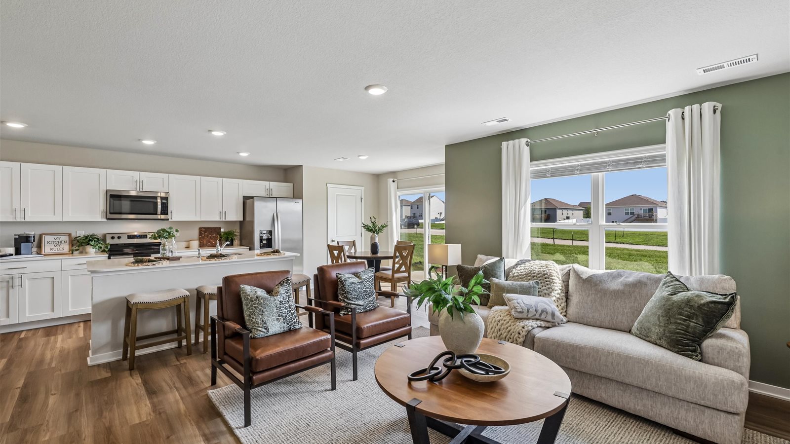 Open concept living room with electric fireplace