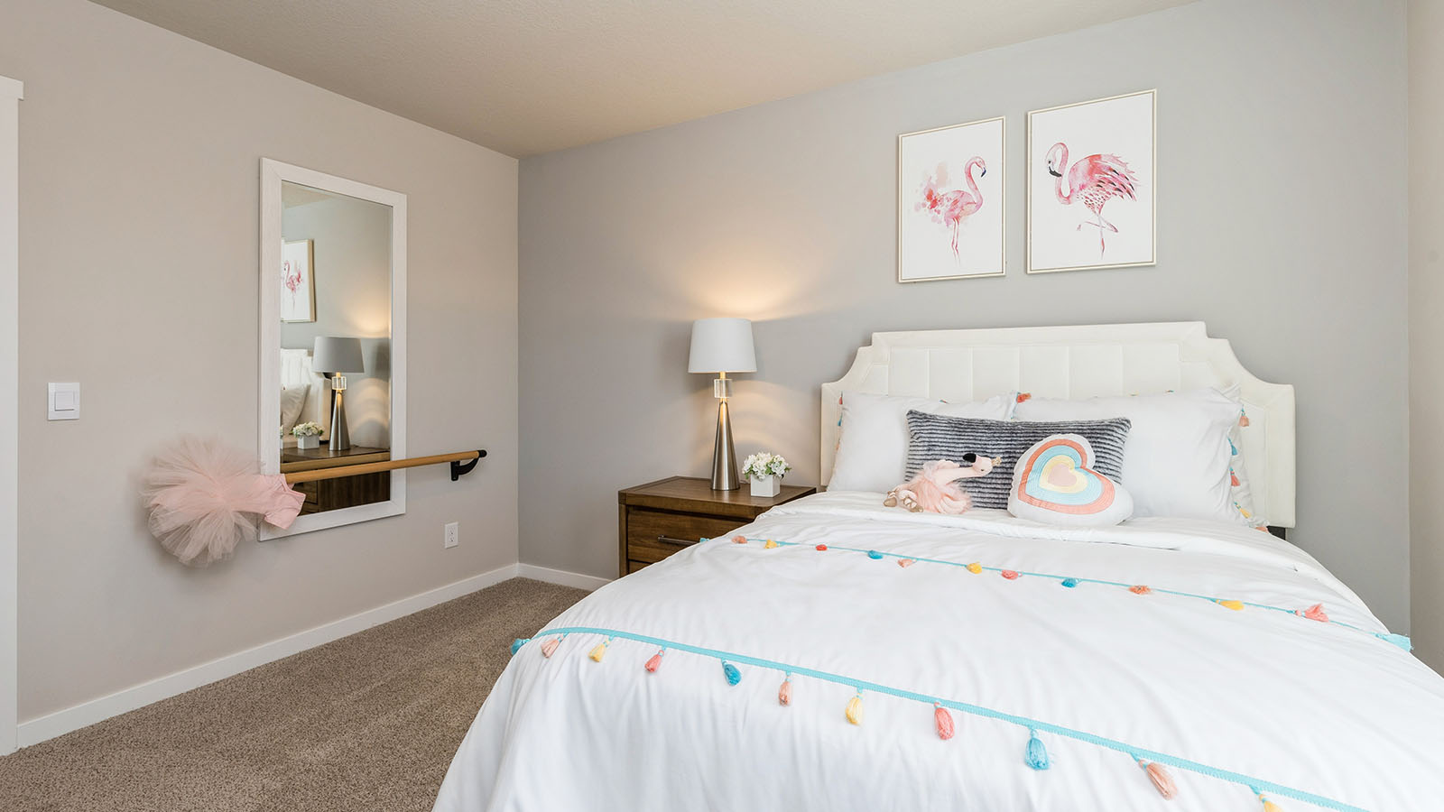 Comfortable secondary bedroom with natural light, modern finishes, and versatile living space.