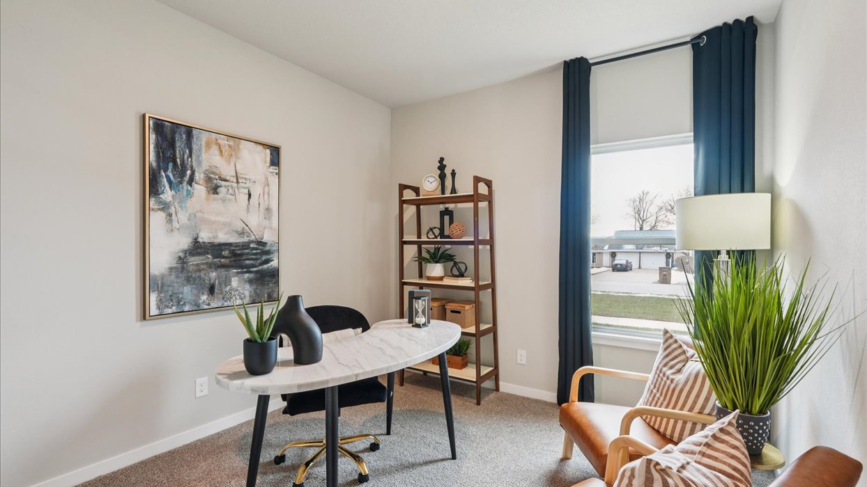 Comfortable secondary bedroom with natural light, modern finishes, and versatile living space.