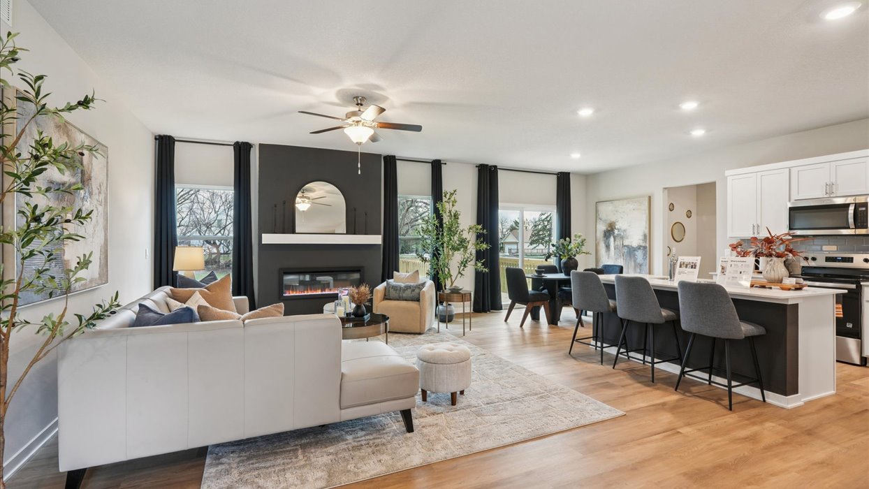 Open concept living room with electric fireplace