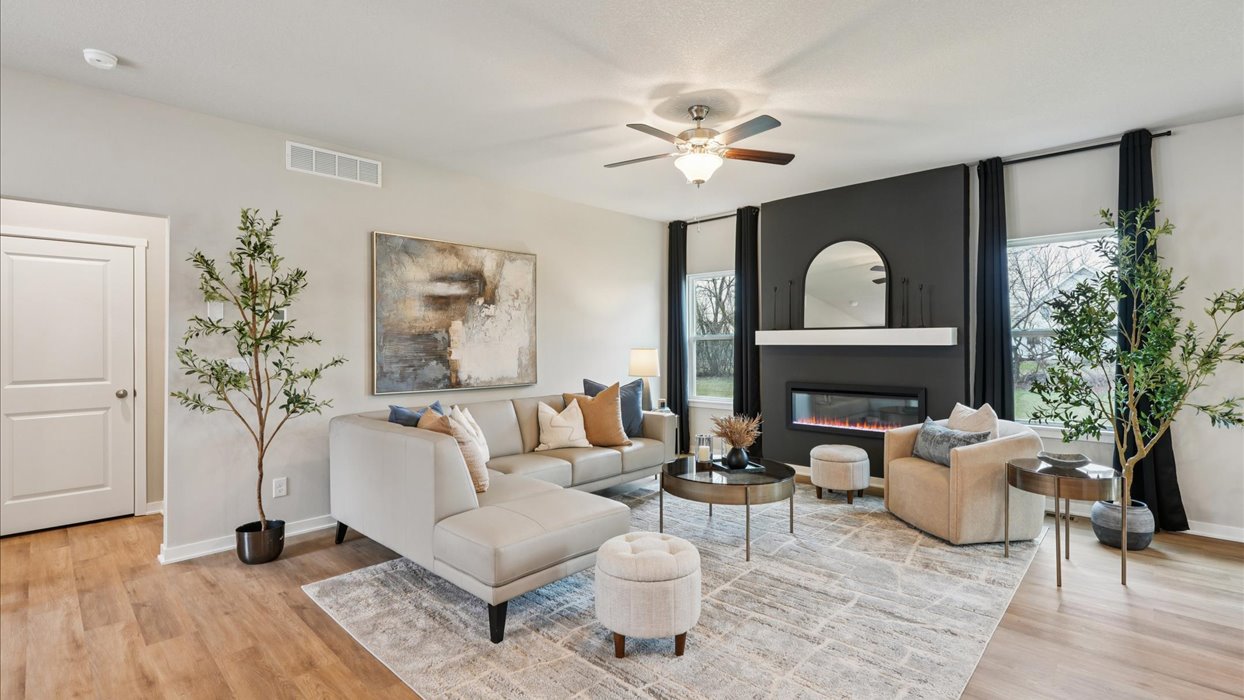 Open concept living room with electric fireplace