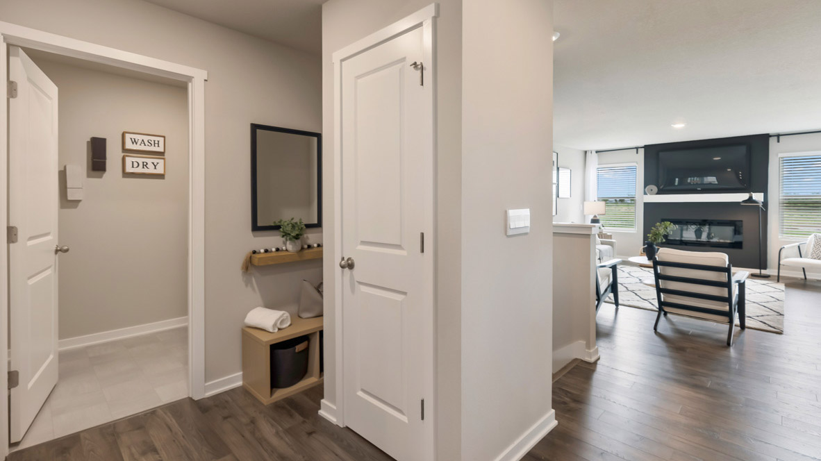 Garage entry with storage closet