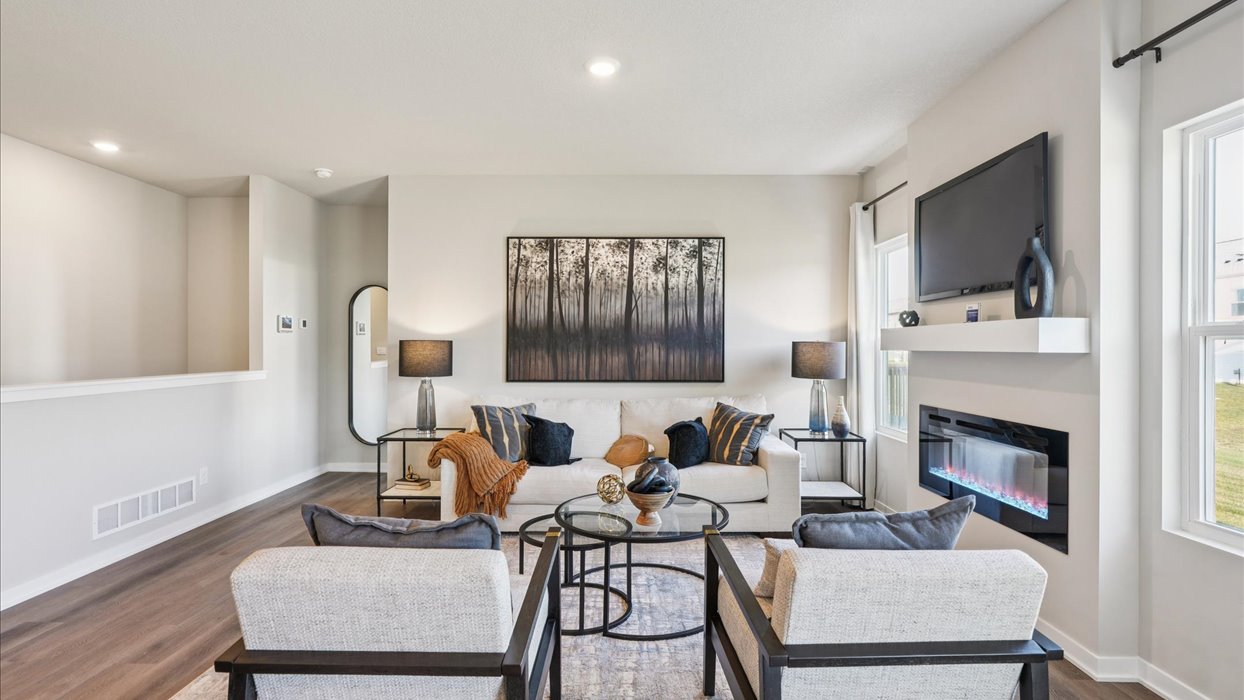Open concept living room with electric fireplace