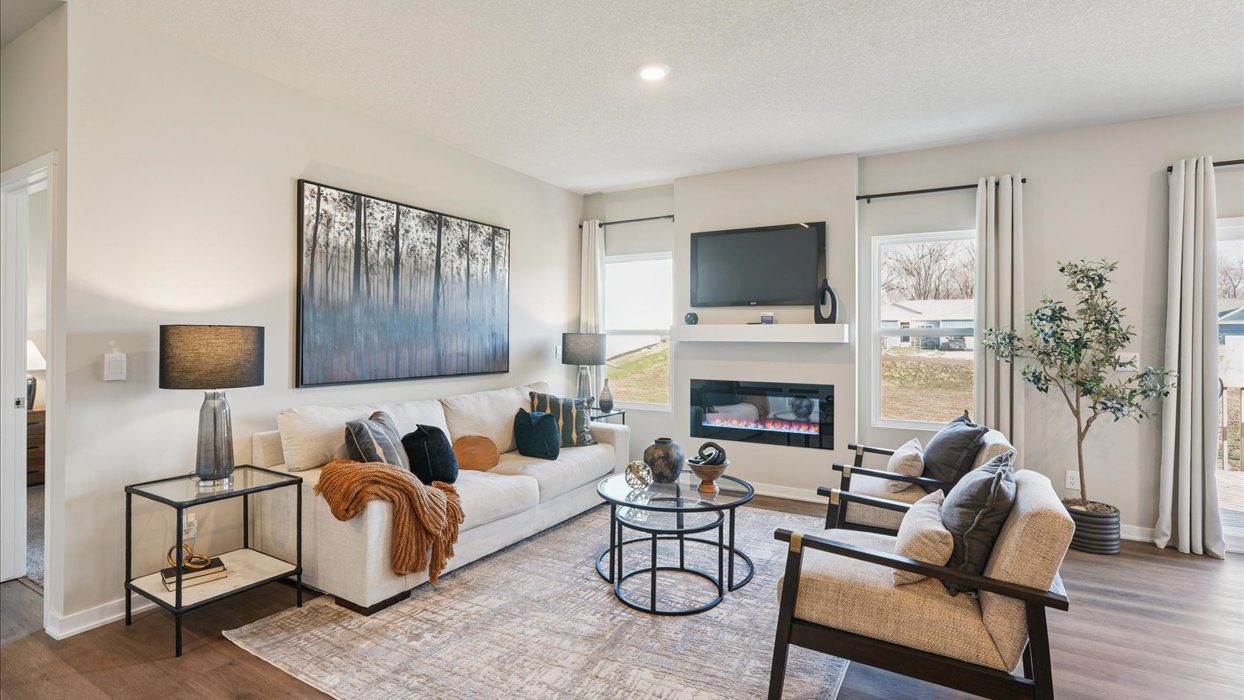 Open concept living room with electric fireplace
