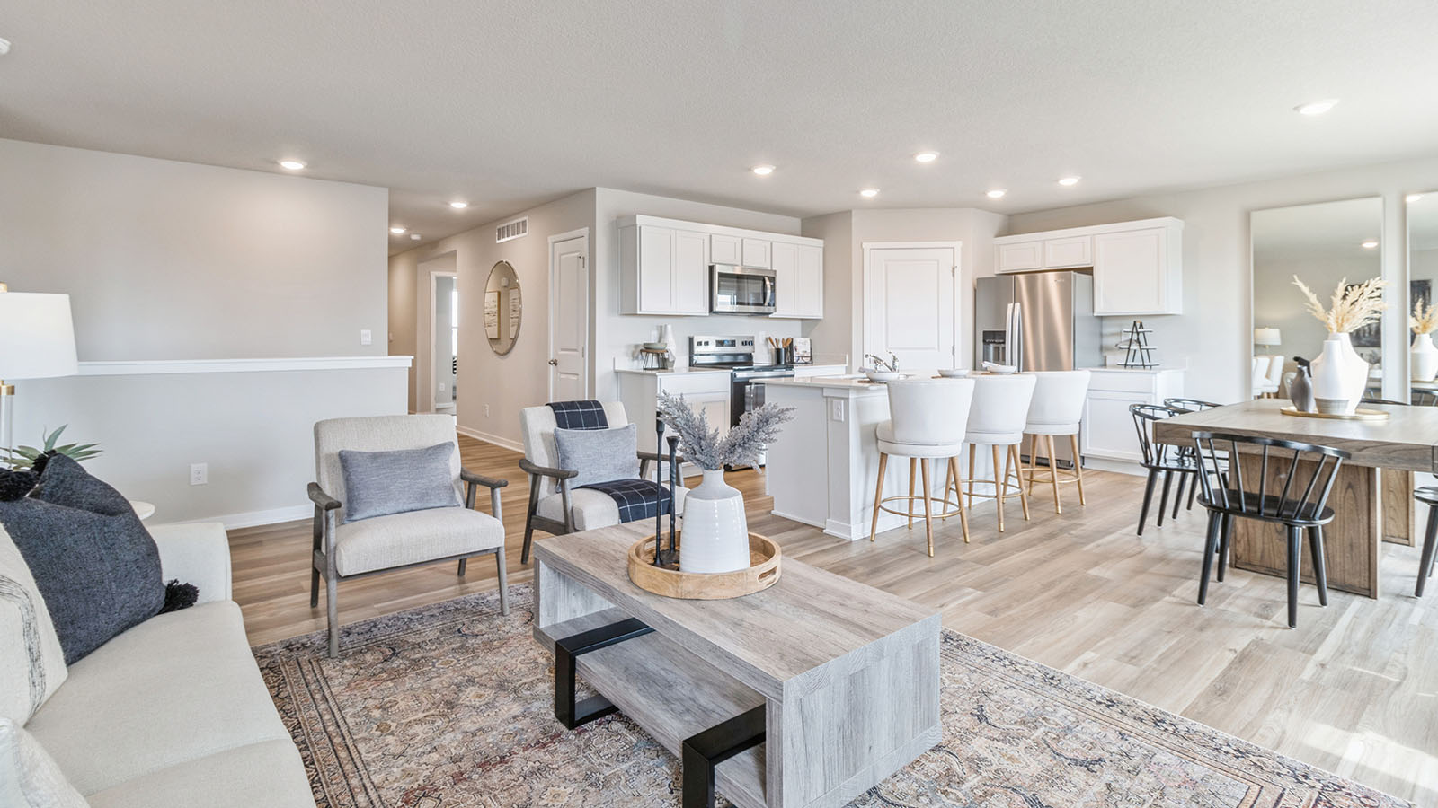 Open concept living room with electric fireplace