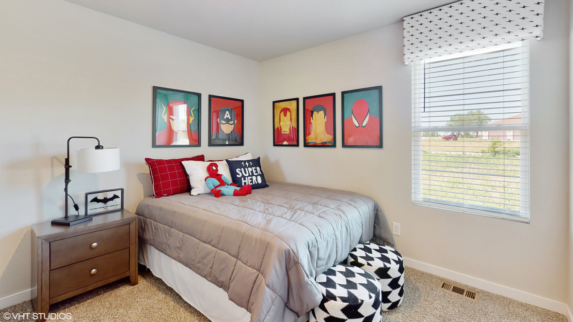 Comfortable secondary bedroom with natural light, modern finishes, and versatile living space.