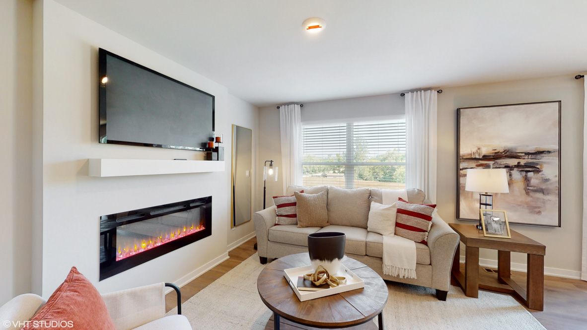 Open concept living room with electric fireplace