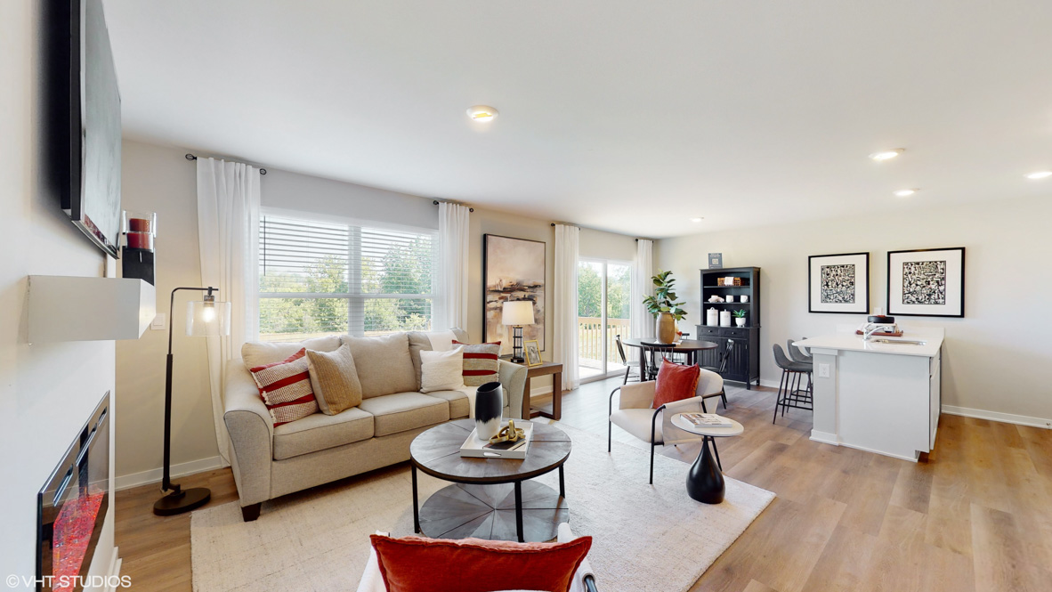 Open concept living room with electric fireplace