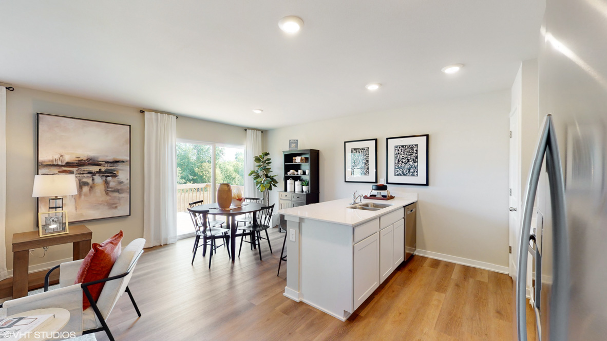 Kitchen with white cabinetry and quartz countertop