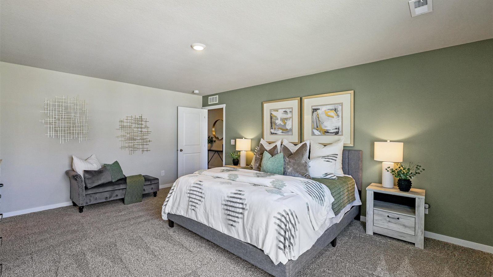 Primary bedroom with natural lighting and spacious layout
