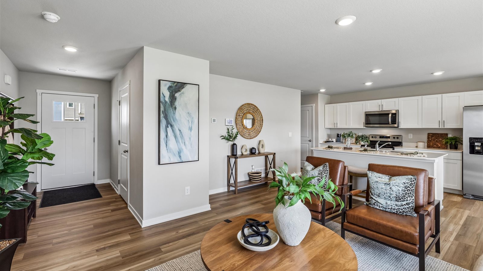 Open concept living room with electric fireplace