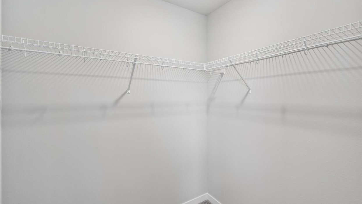Spacious walk-in closet offering ample room for clothing, accessories, and everyday essentials.