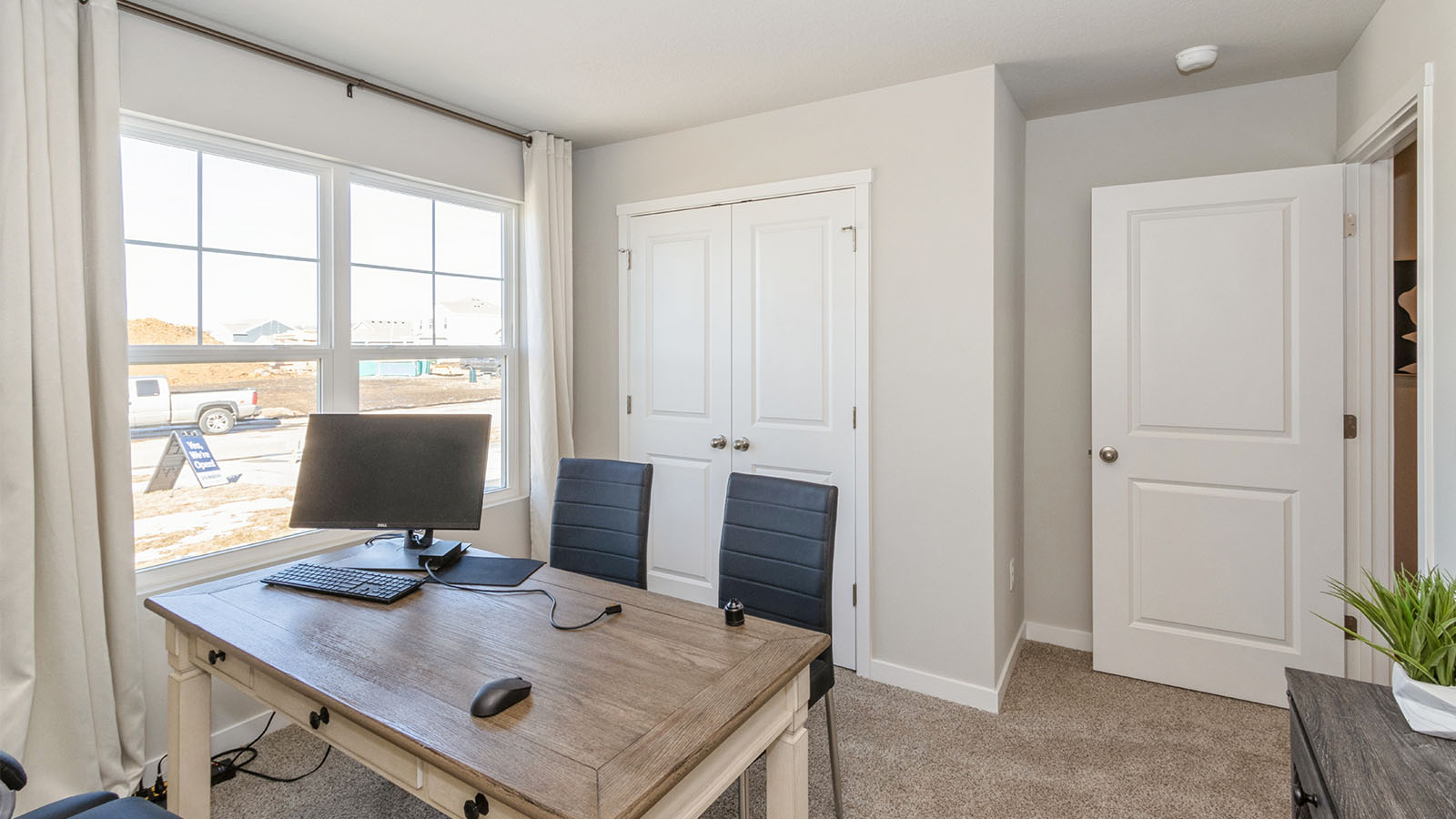 Comfortable secondary bedroom with natural light, modern finishes, and versatile living space.