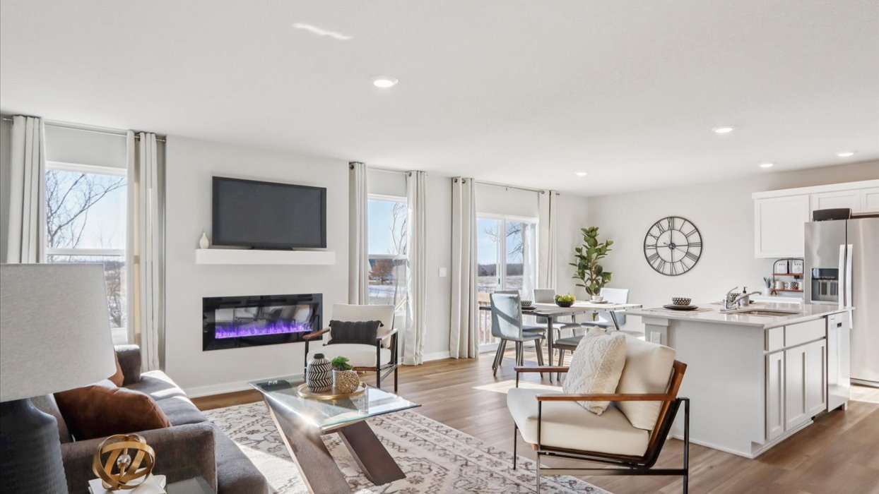 Open concept living room with electric fireplace