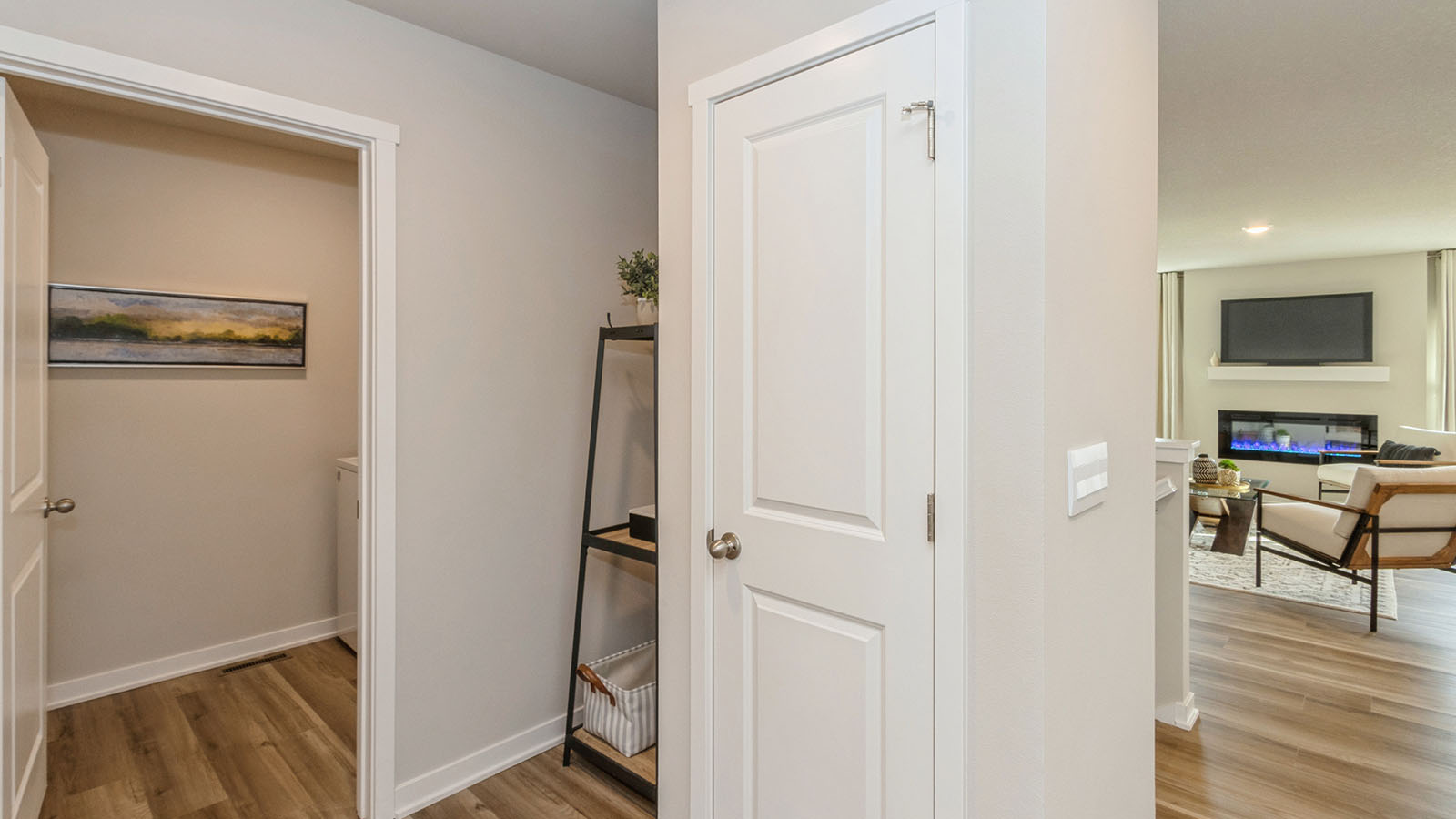Entry space from the garage featuring a convenient coat closet and room for organization.