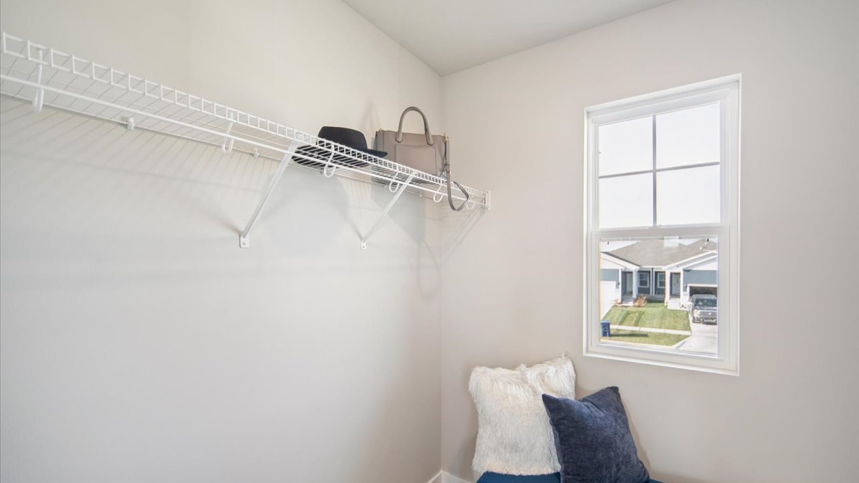 Spacious walk-in closet offering ample room for clothing, accessories, and everyday essentials.
