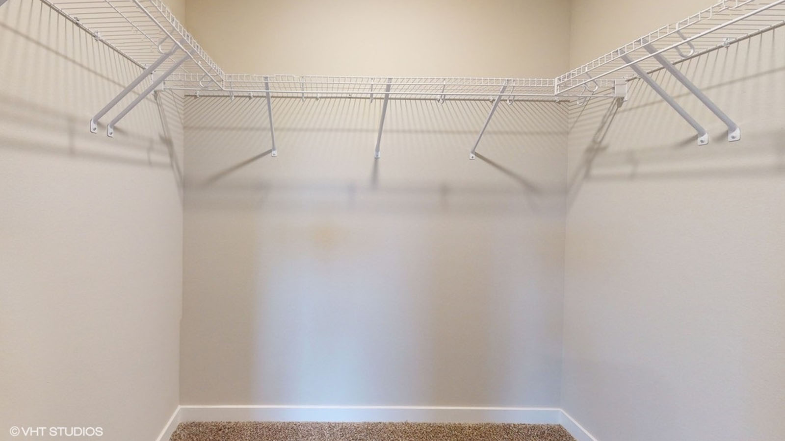 Spacious walk-in closet offering ample room for clothing, accessories, and everyday essentials.