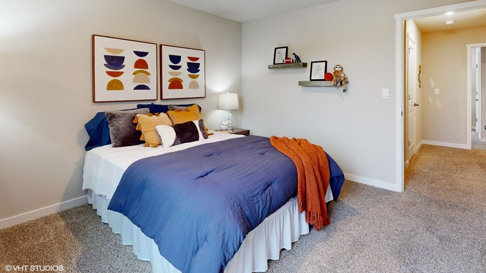Comfortable secondary bedroom with natural light, modern finishes, and versatile living space.