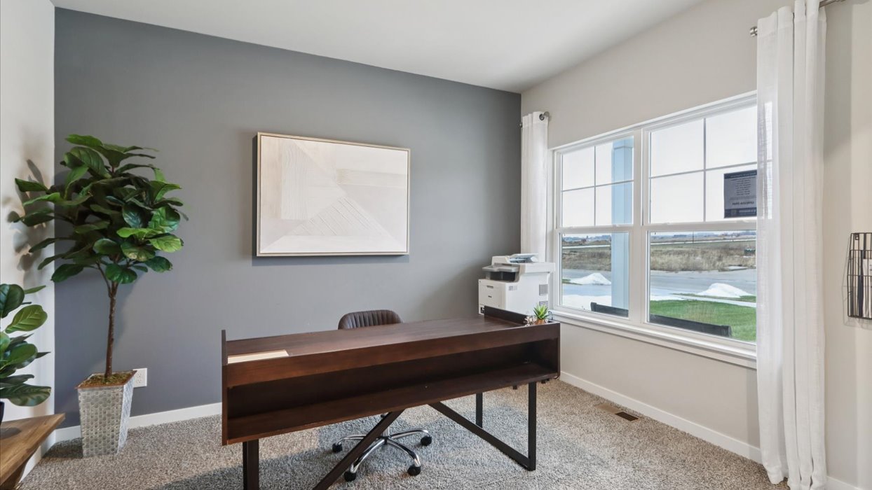 Flex room on main floor next to entry that could be a office or sitting room