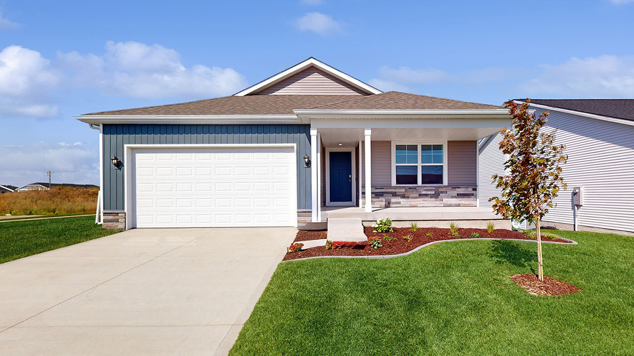 front exterior of hamilton home with 2 car attached garage