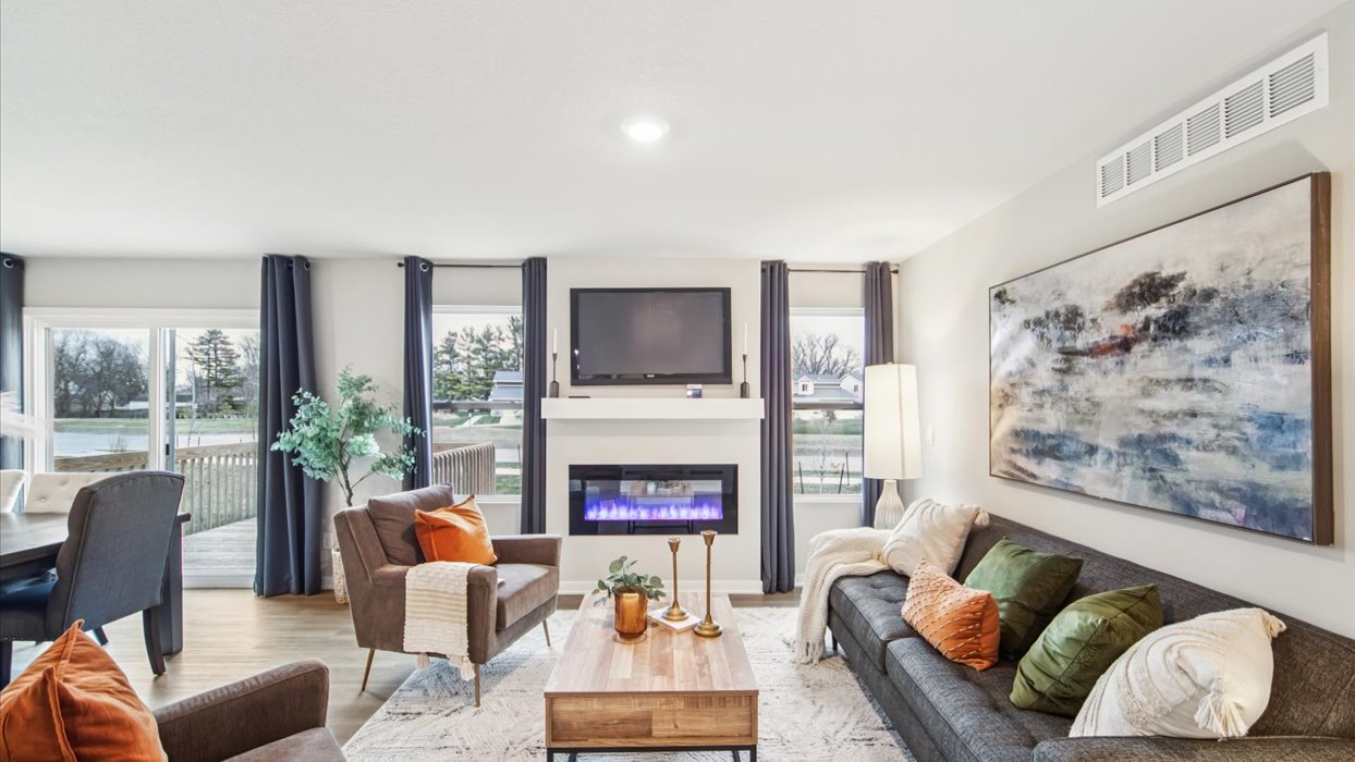 Open concept living room with electric fireplace