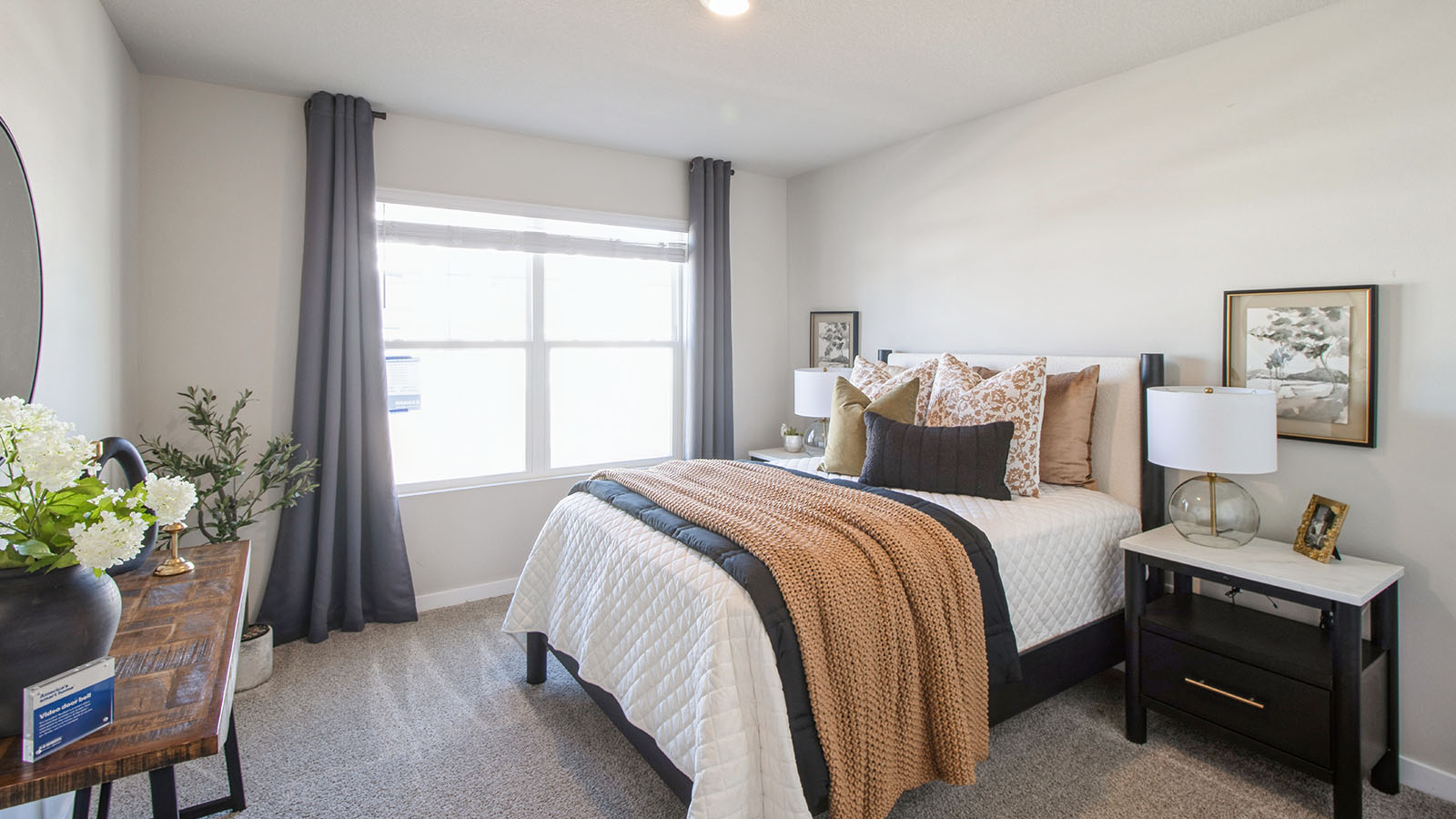 Comfortable secondary bedroom with natural light, modern finishes, and versatile living space.
