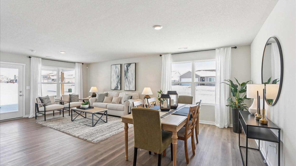 open concept living room and kitchen with lots of natural light
