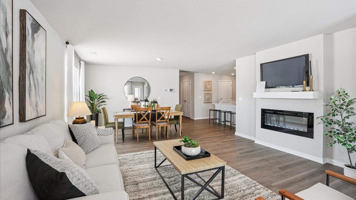 olsen living room with view of dining room and kitchen