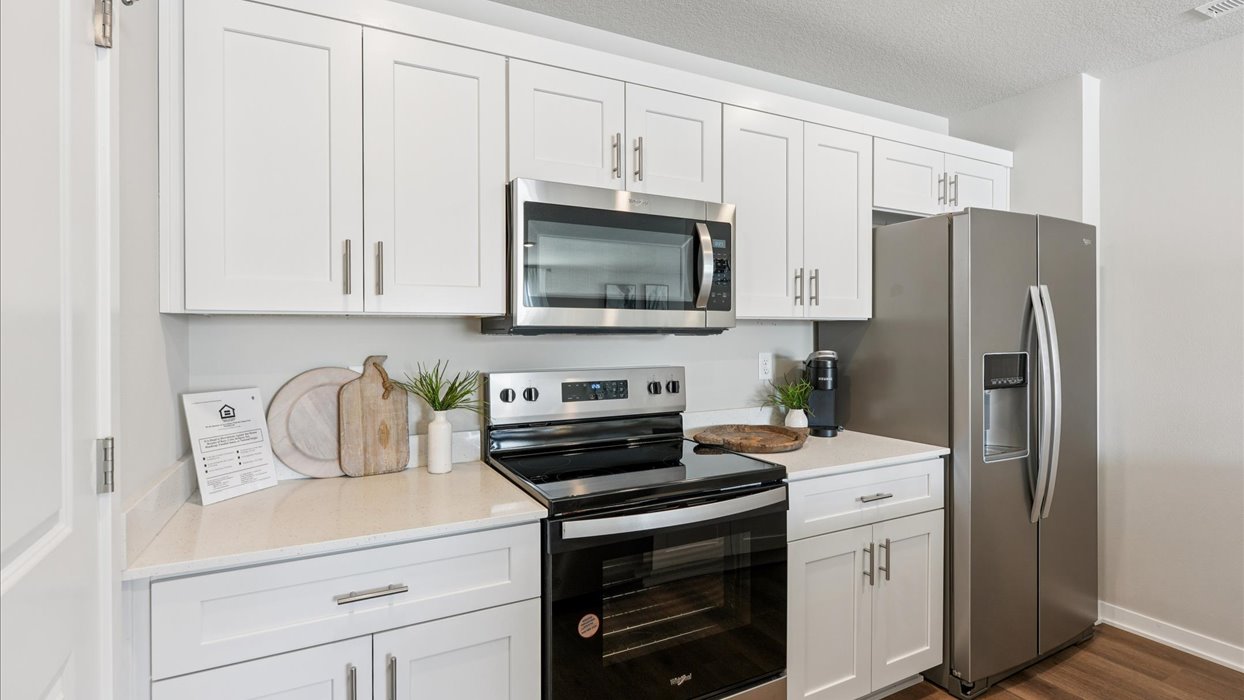 white kitchen with quartz countertops
