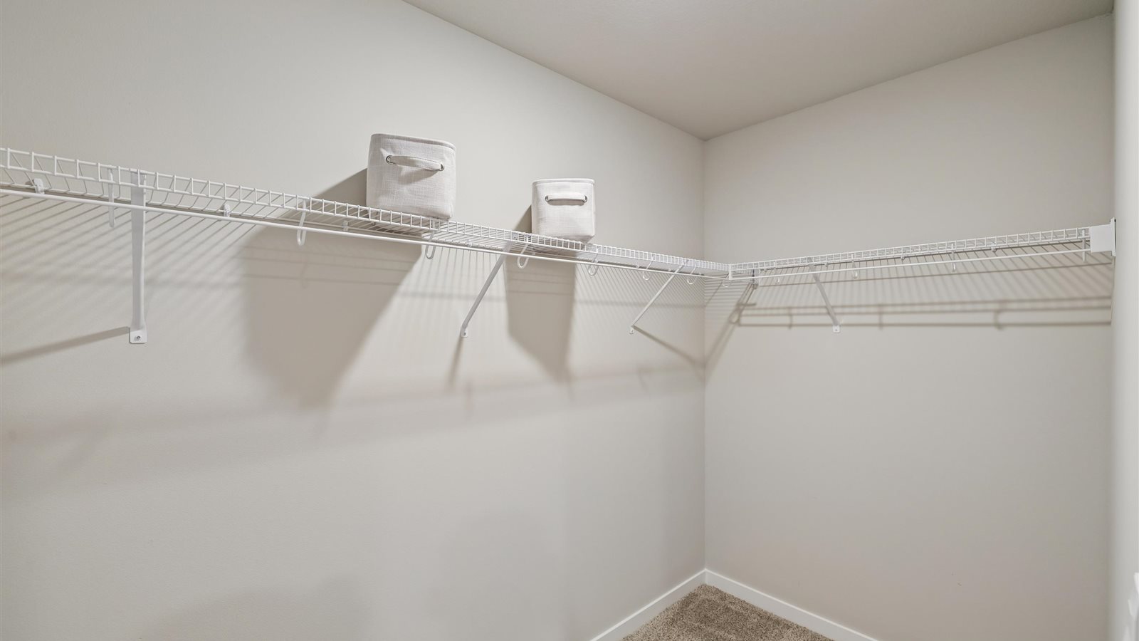Spacious walk-in closet offering ample room for clothing, accessories, and everyday essentials.