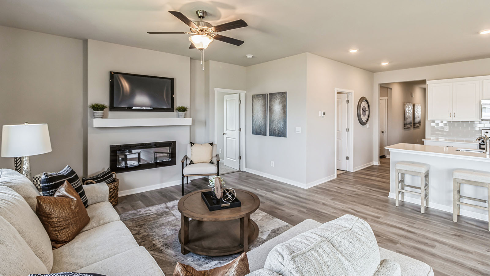 Open concept living room with electric fireplace