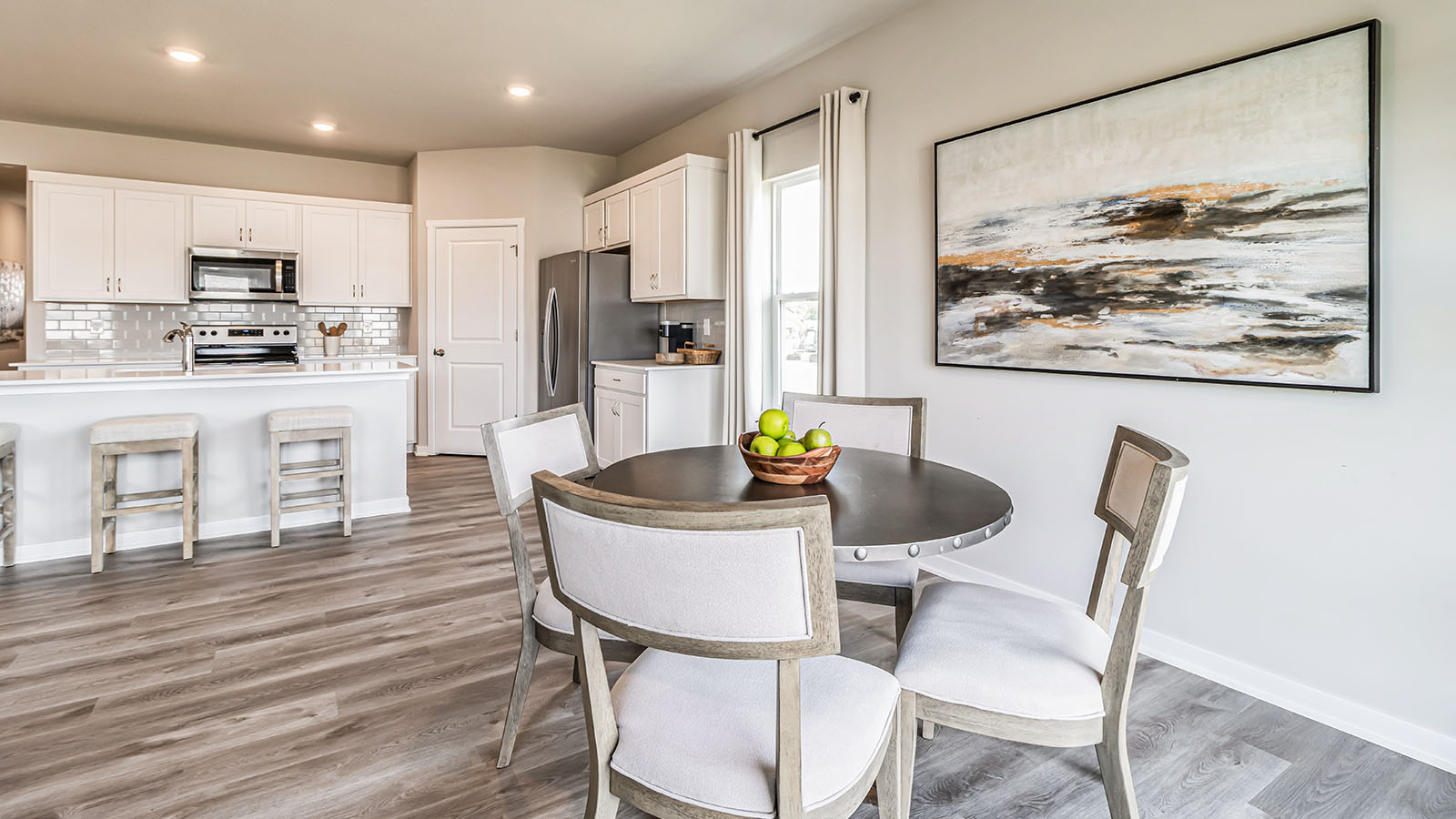 Open concept dining space with access to backyard