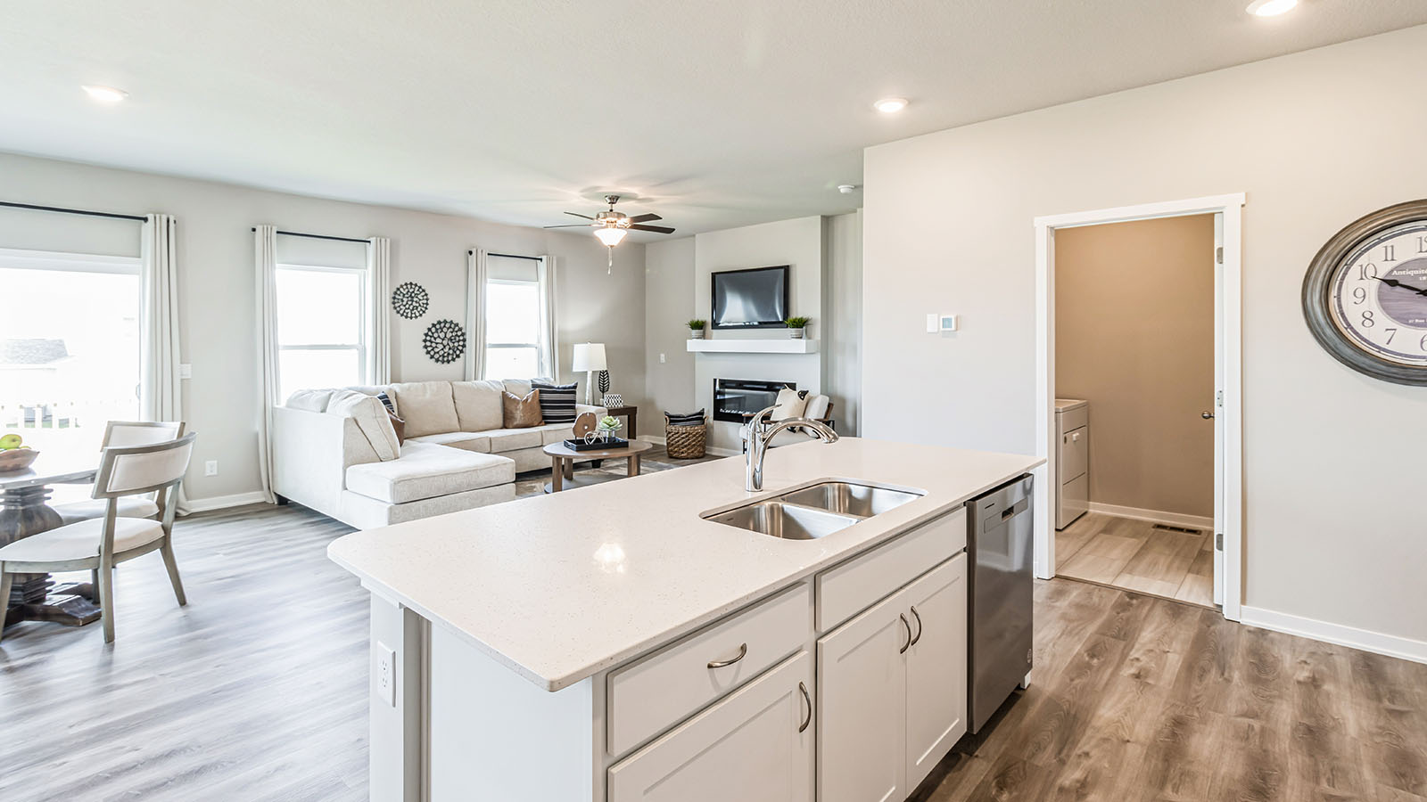 Kitchen with white cabinetry and quartz countertop