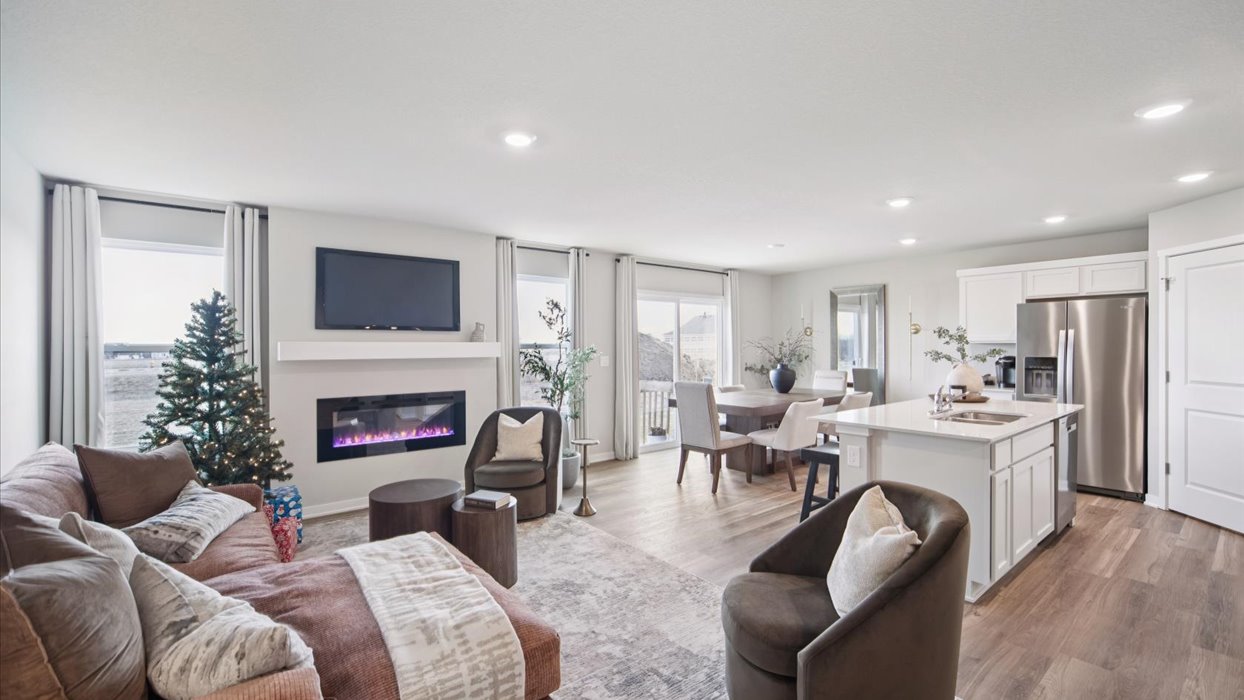 spacious hamilton living room with lots of windows and overhead lighting