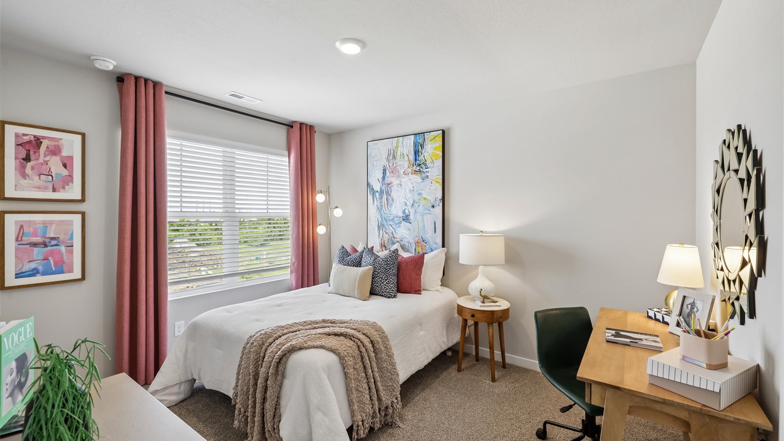 Comfortable secondary bedroom with natural light, modern finishes, and versatile living space.