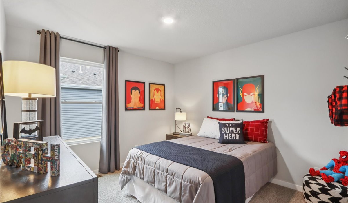 Comfortable secondary bedroom with natural light, modern finishes, and versatile living space.