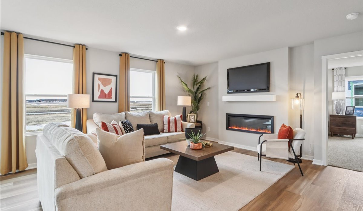 Open concept living room with electric fireplace