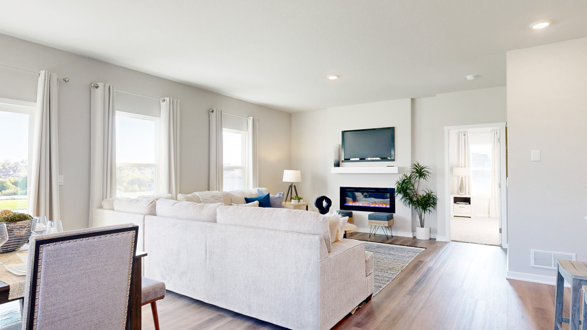 Open concept living room with electric fireplace