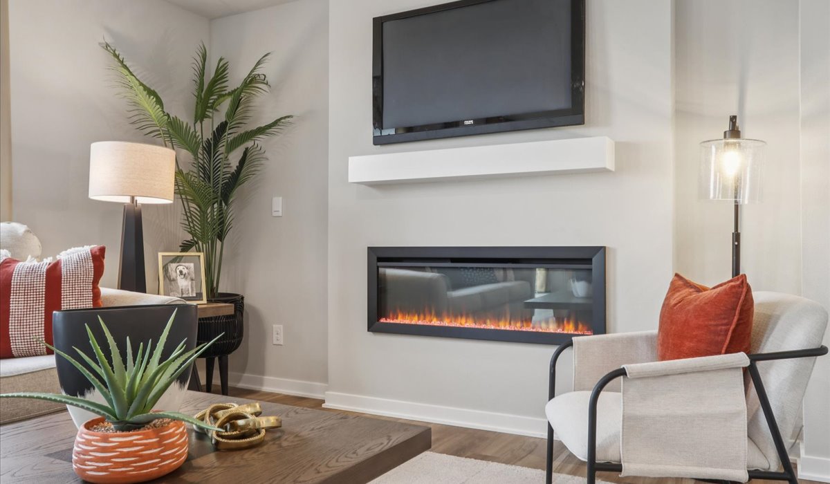Open concept living room with electric fireplace