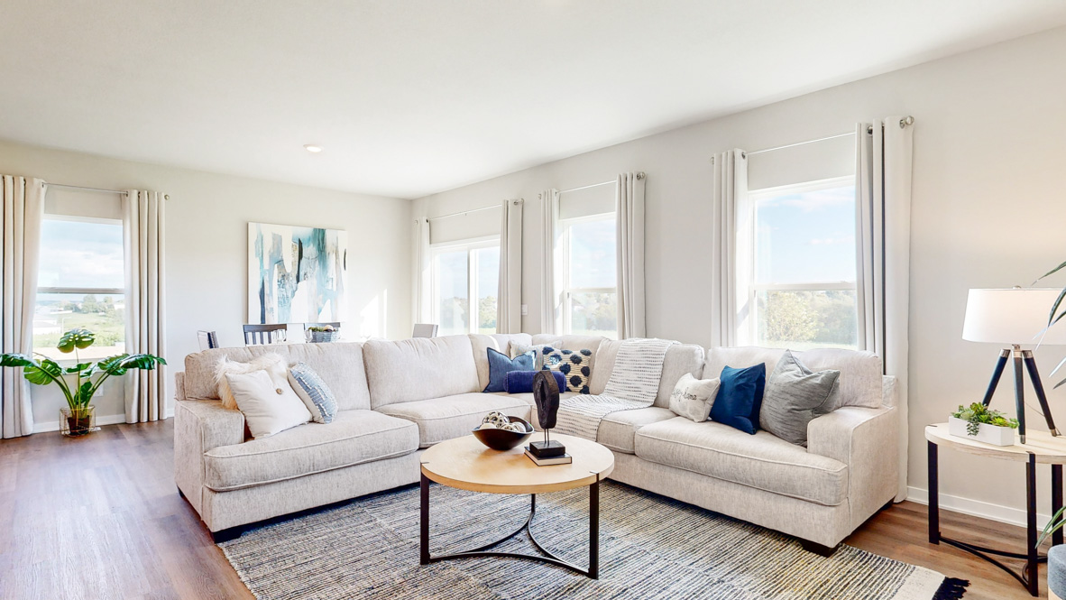 Open concept living room with electric fireplace