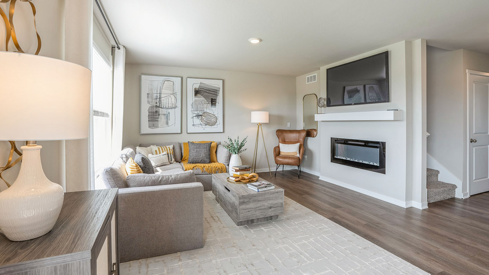 Open concept living room with electric fireplace