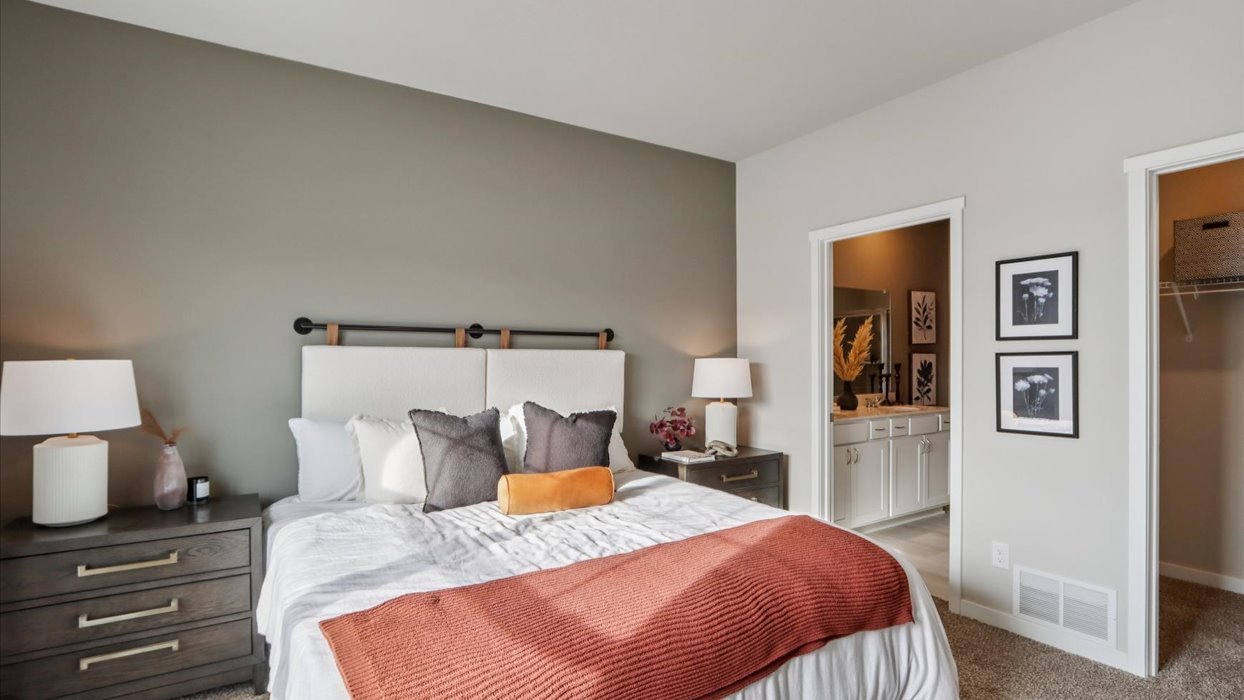 Primary bedroom with natural lighting and spacious layout